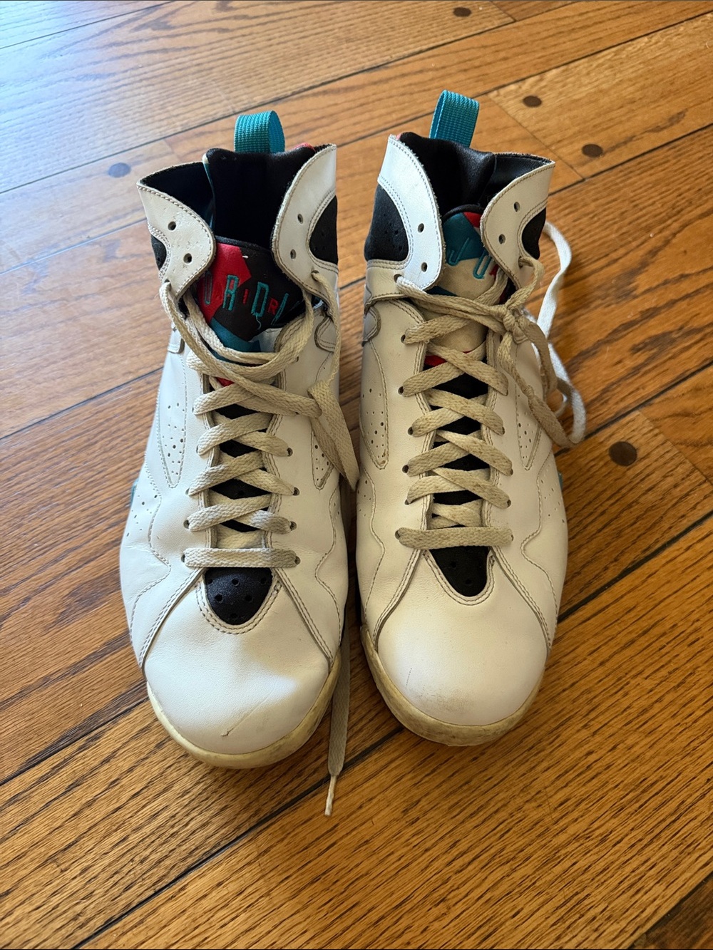 Jordan Men's White High-Top Basketball Sneakers with Teal and Red Accents